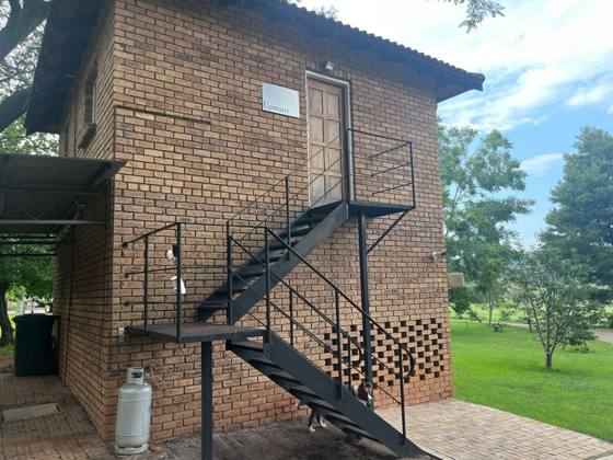 The Upstairs unit and its outside staircase