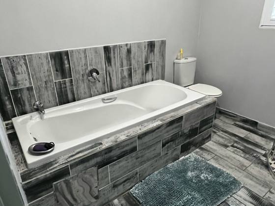 Bathroom with a bath
