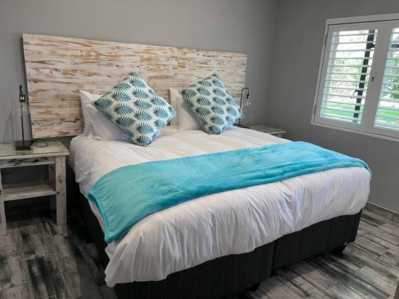Main bedroom with a king bed
